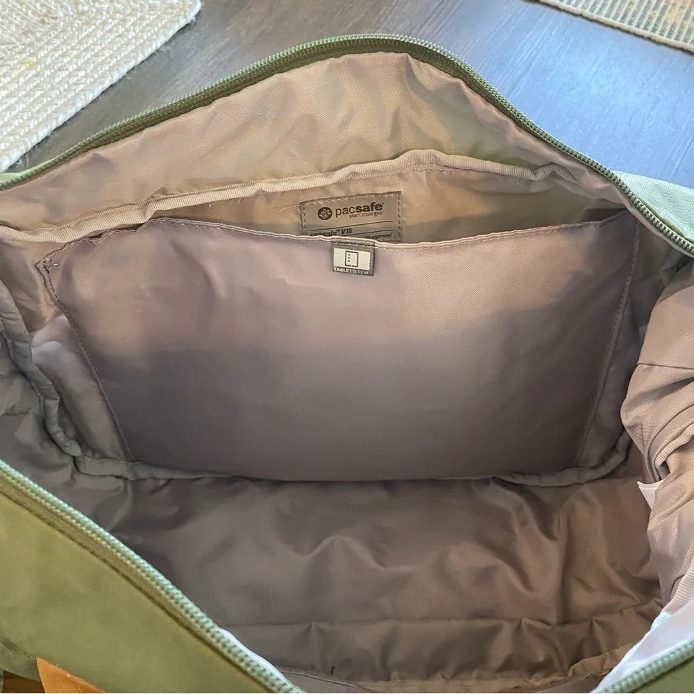 Pacsafe Olive Green and Mustard Yellow Crossbody Camera Bag